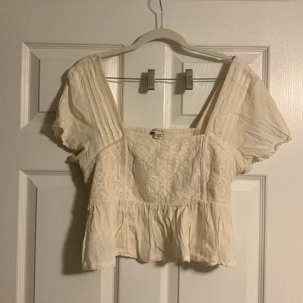 AMERICAN EAGLE cream color cropped shirt in size medium